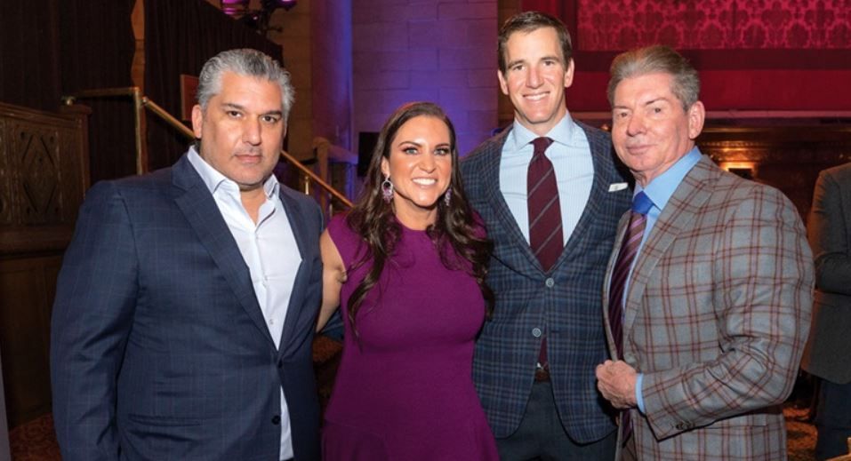 Nick Khan, Stephanie McMahon, Eli Manning, and Vince McMahon.