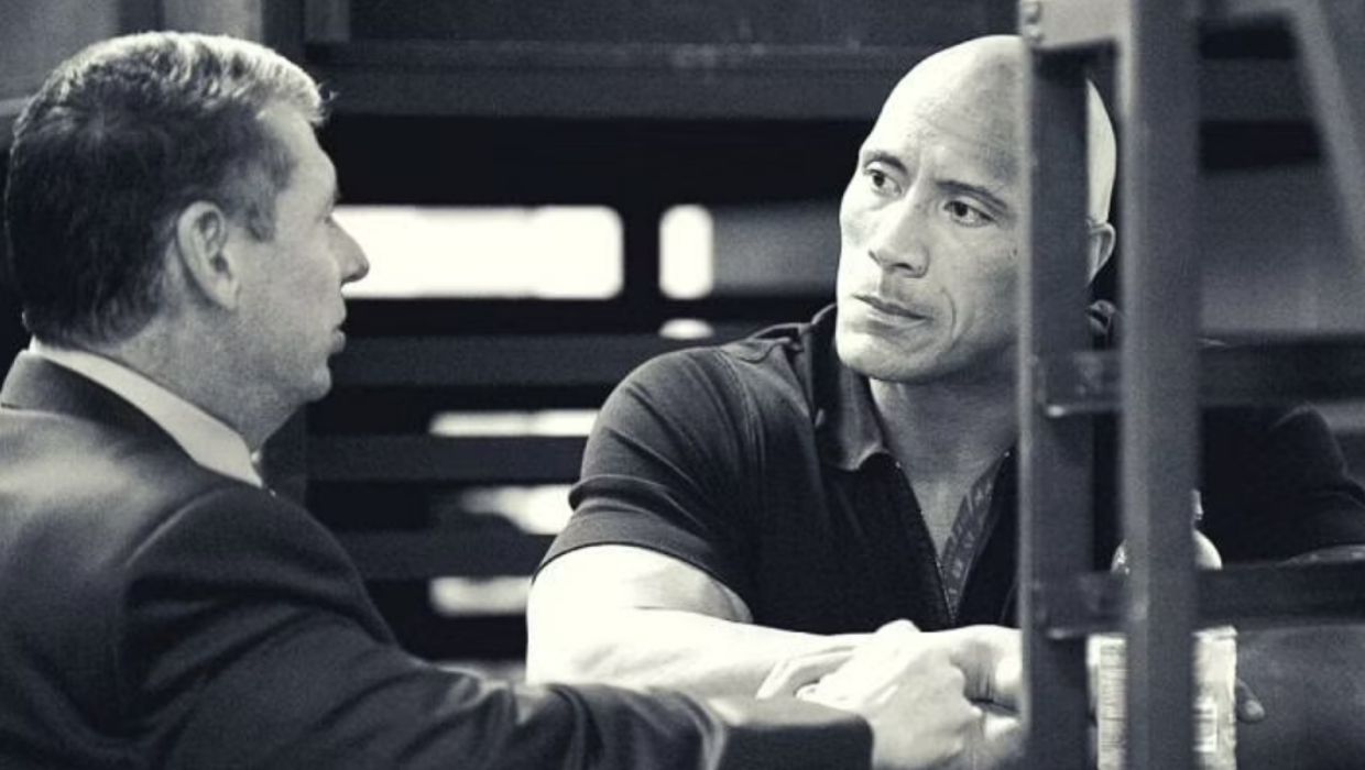 Vince McMahon and The Rock talking backstage