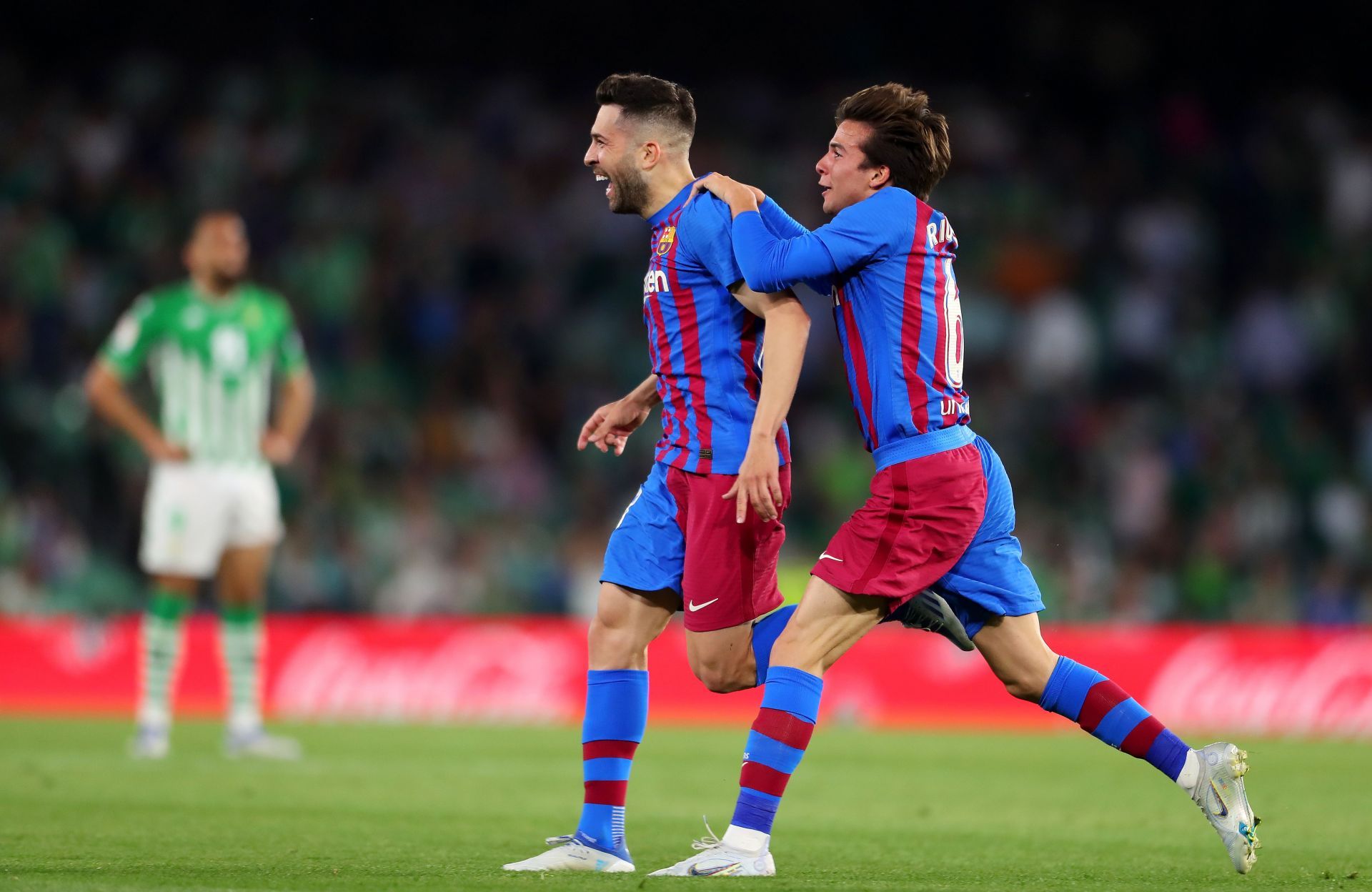 Jordi Alba celebrates after scoring a goal.