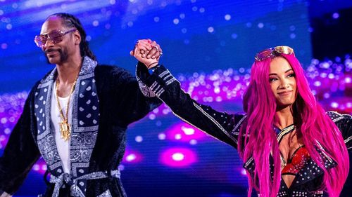 Snoop Dogg joins Sasha Banks as she makes her entrance at WrestleMania 32