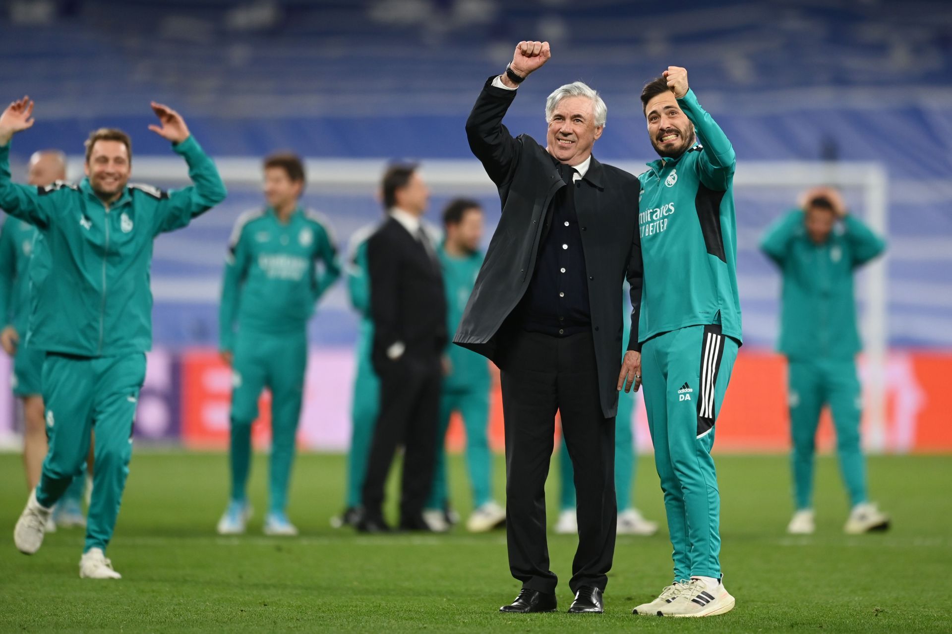 Carlo Ancelotti celebrates with Davide Ancelotti.
