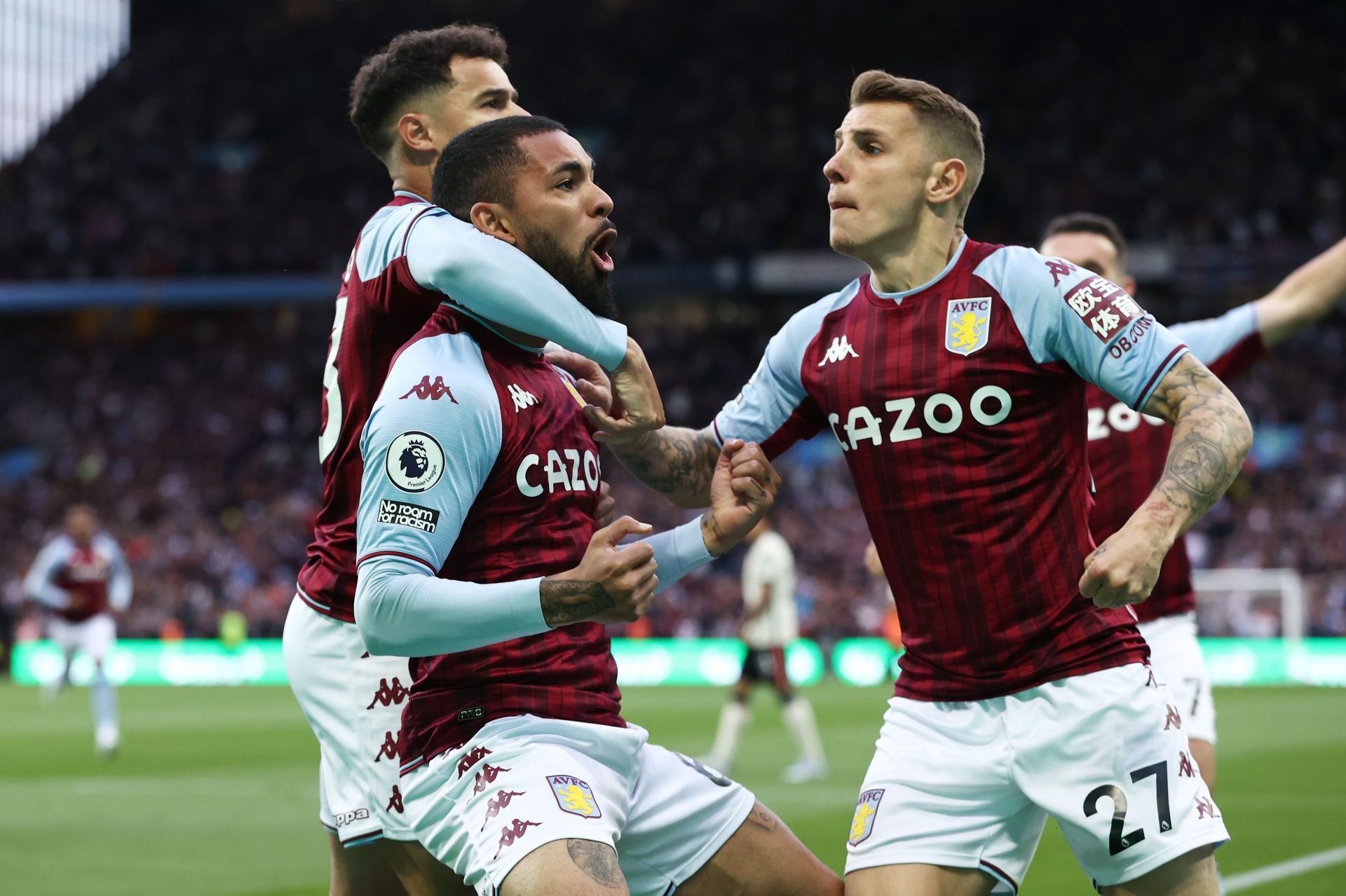 Douglas Luiz (C) and Lucas Digne (R) celebrate Aston Villa's opener