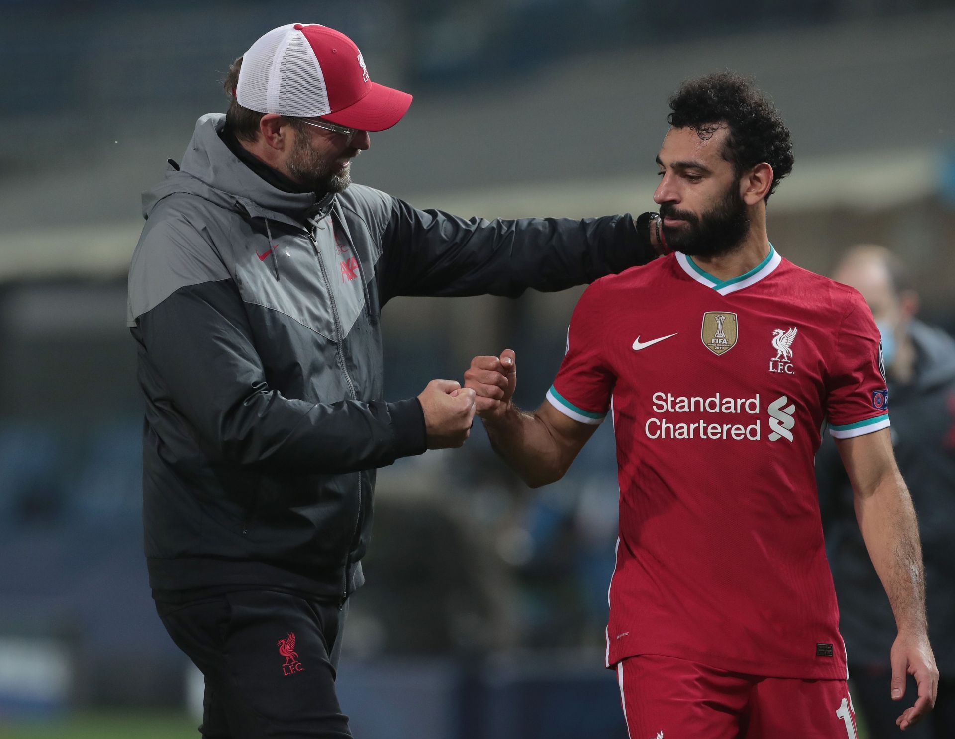 Jurgen Klopp and Mohamed Salah (R) during a Liverpool game