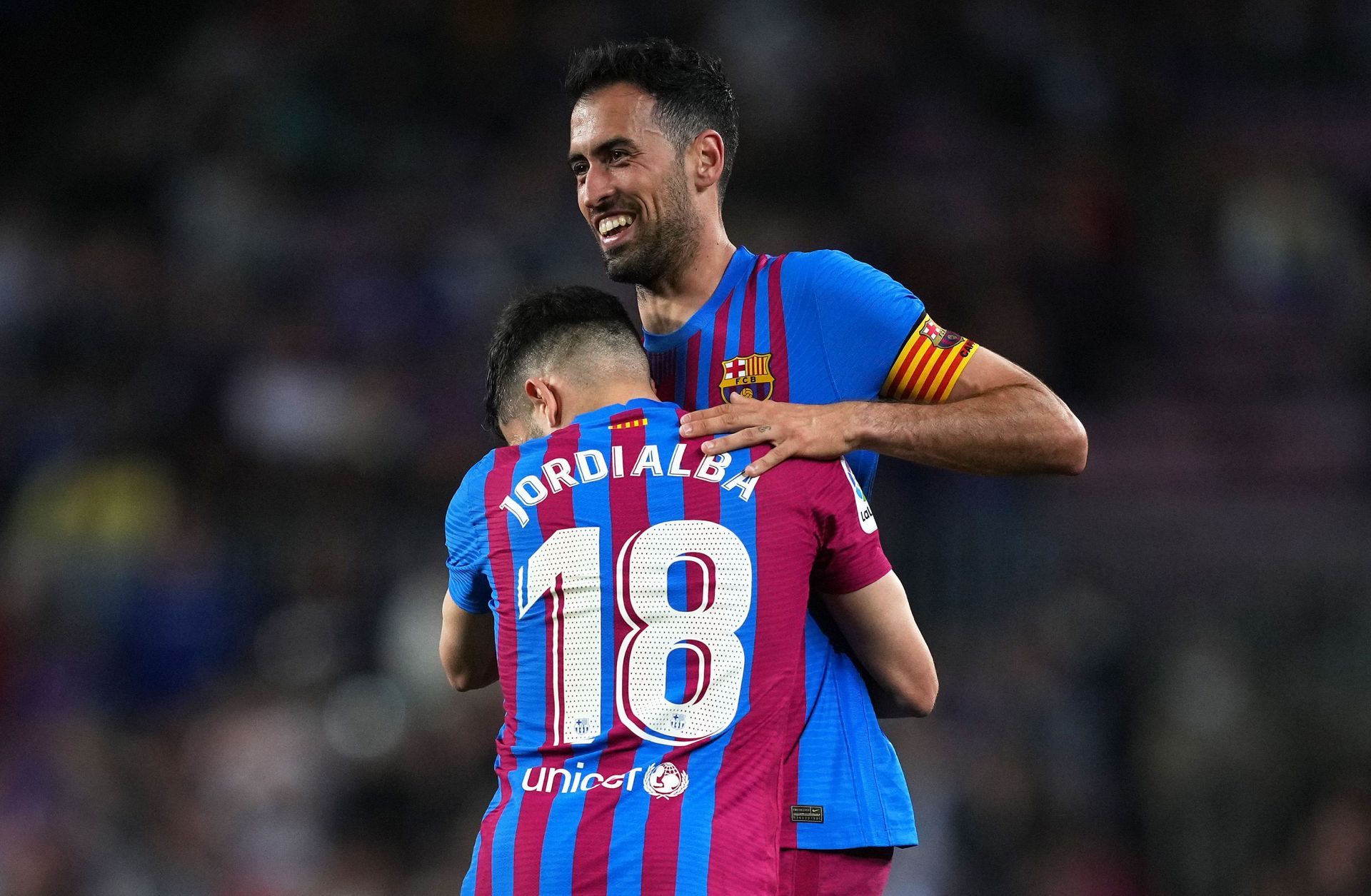 Jordi Alba celebrates with Sergio Busquets.