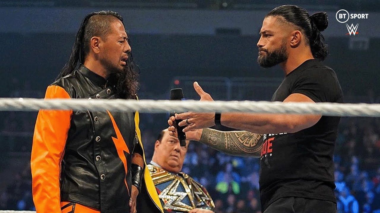 WWE&#039;s Roman Reigns and Shinsuke Nakamura, with Paul Heyman lurking in the background