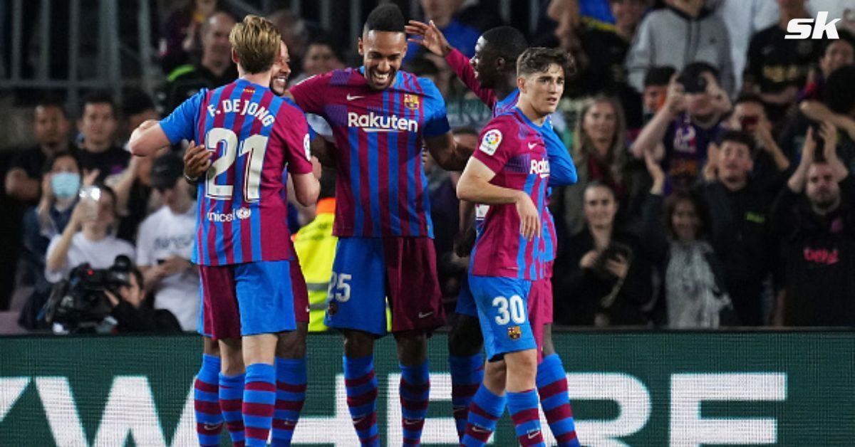 Barcelona players react during their match against Celta Vigo.