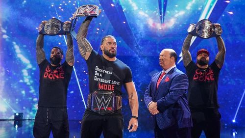 Roman Reigns, The Usos, and Paul Heyman