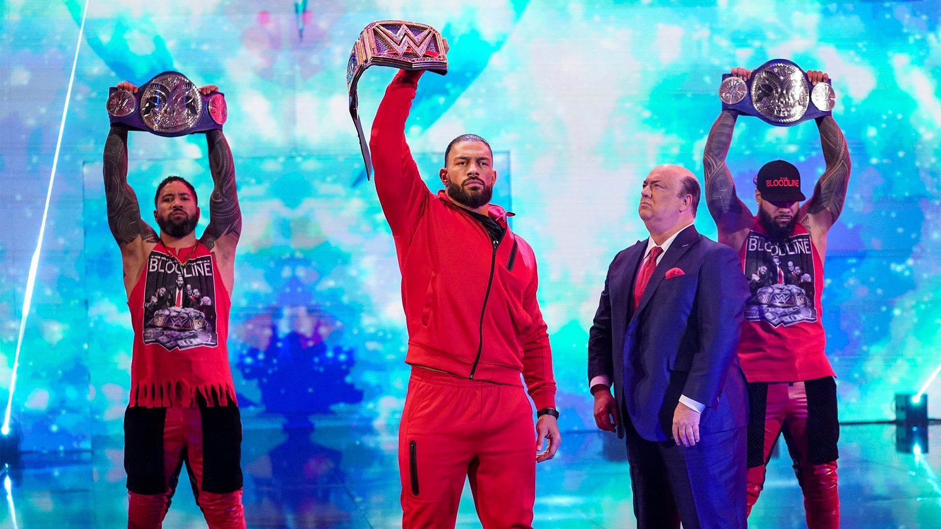 Roman Reigns, The Usos, and Paul Heyman