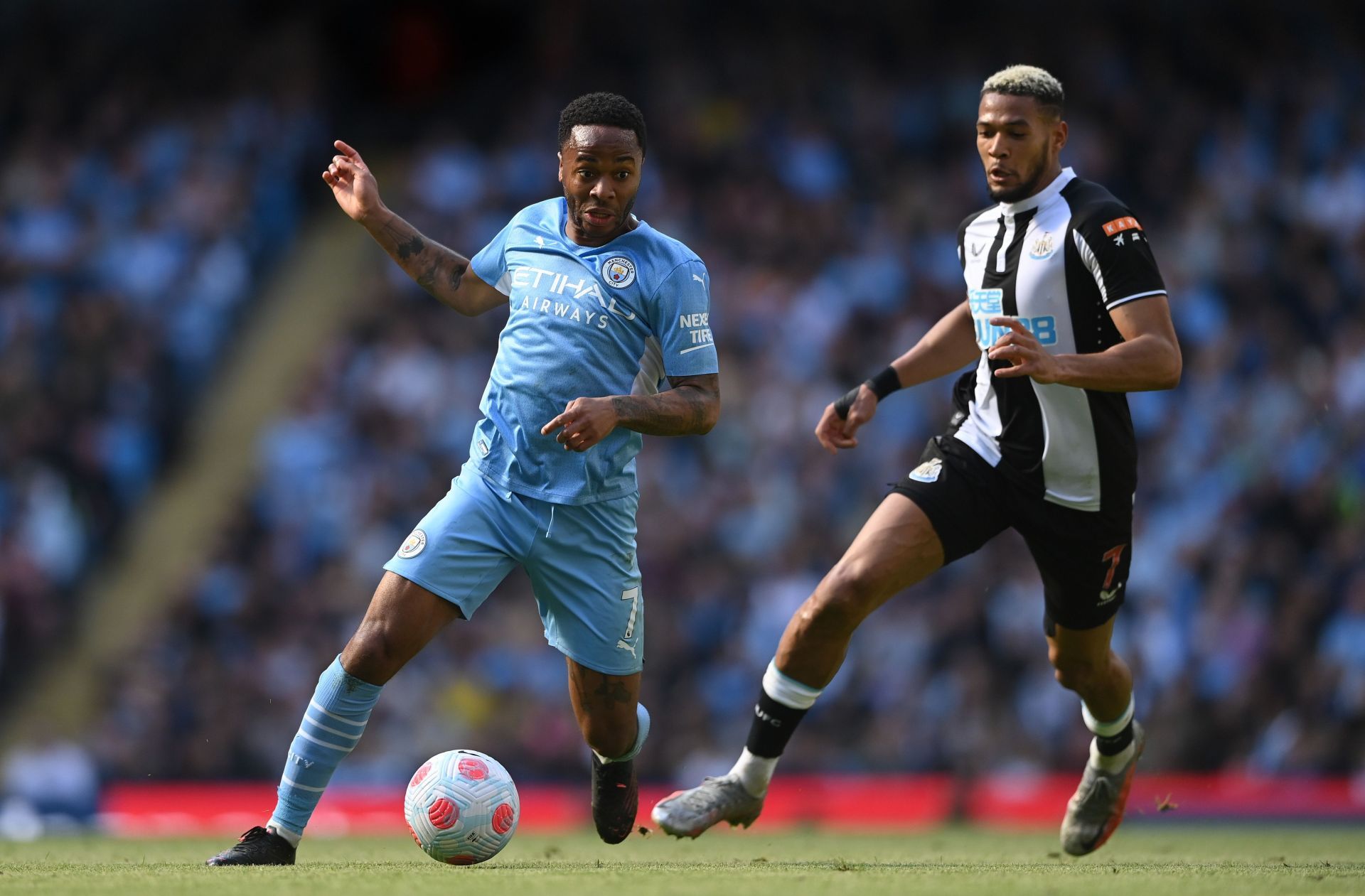 Raheem Sterling (left) is wanted at the Emirates.