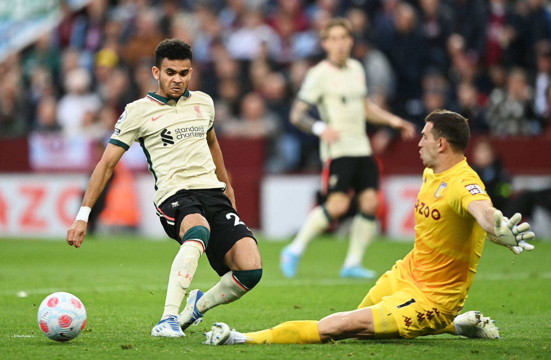 Liverpool's Luis Diaz (L) is foiled by Aston Villa's Martinez