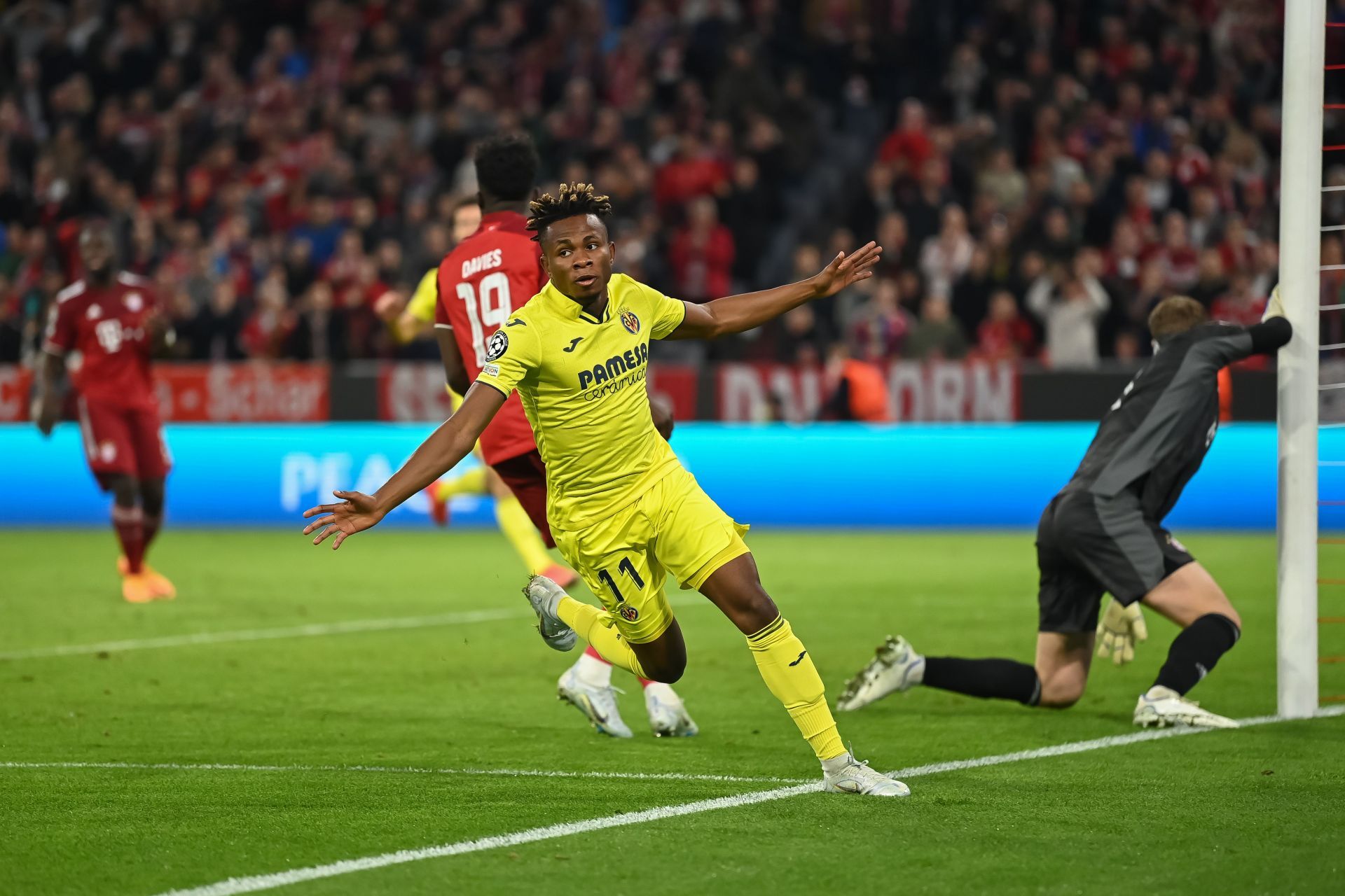 Samuel Chukwueze celebrates after netting a late leveler against Bayern