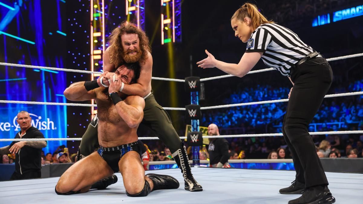 Zayn during a lumberjack match against Drew McIntyre on SmackDown 