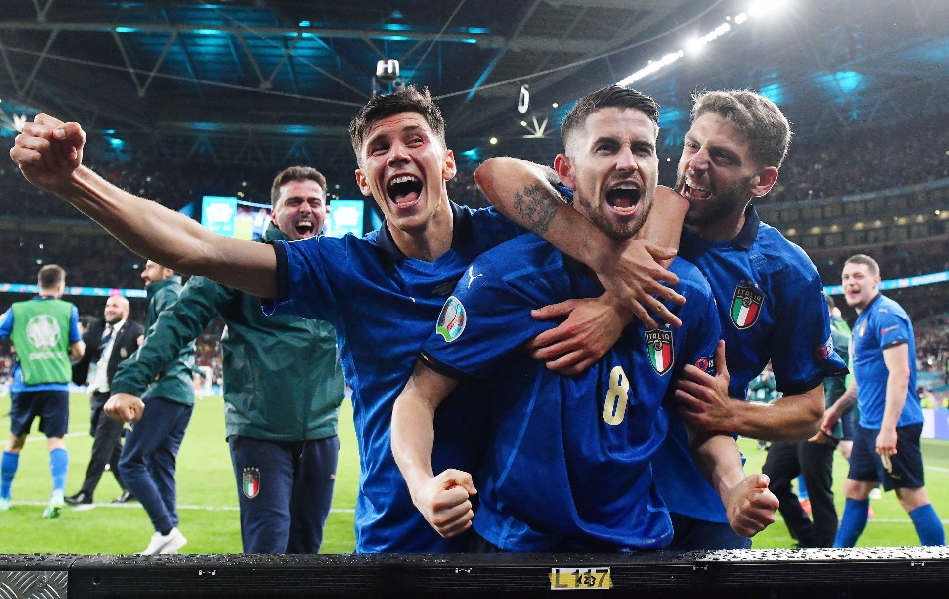 Italy players celebrate after winning a penalty shootout against Spain in the semi-final of Euro 2020