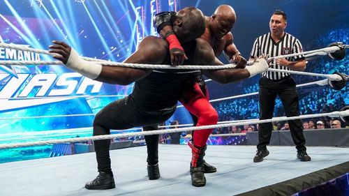 Bobby Lashley and Omos during their match at WrestleMania Backlash