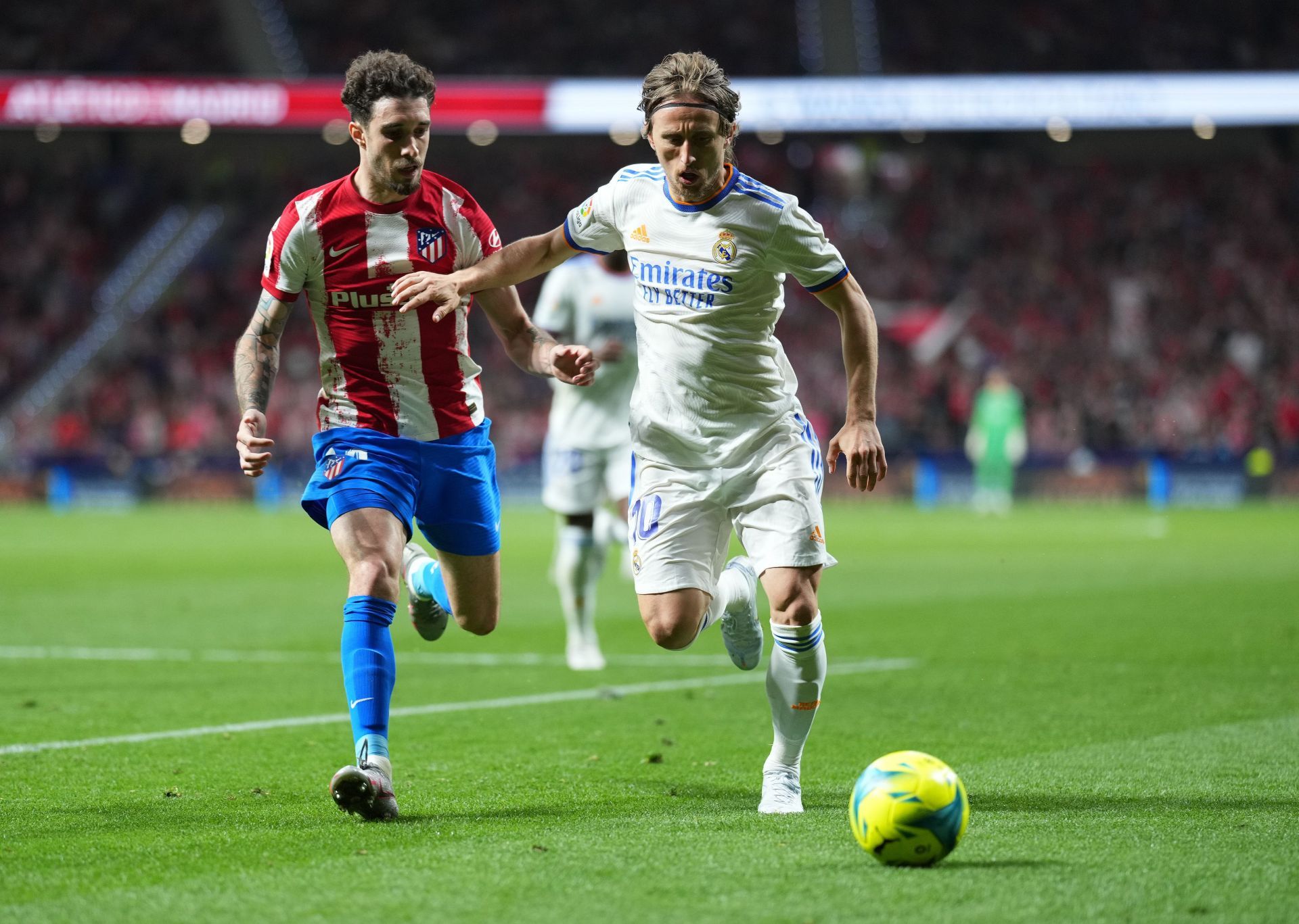 Luka Modric (right) is likely to extend his stay at the Santiago Bernabeu.