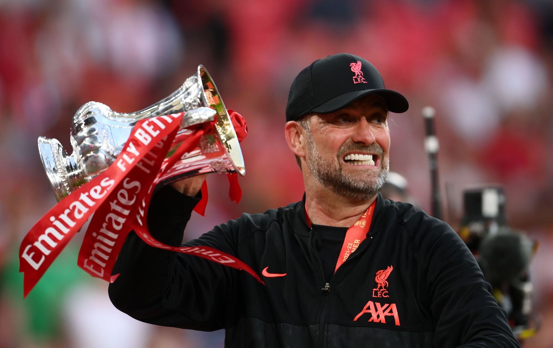 Jurgen Klopp celebrates with the FA CUP.