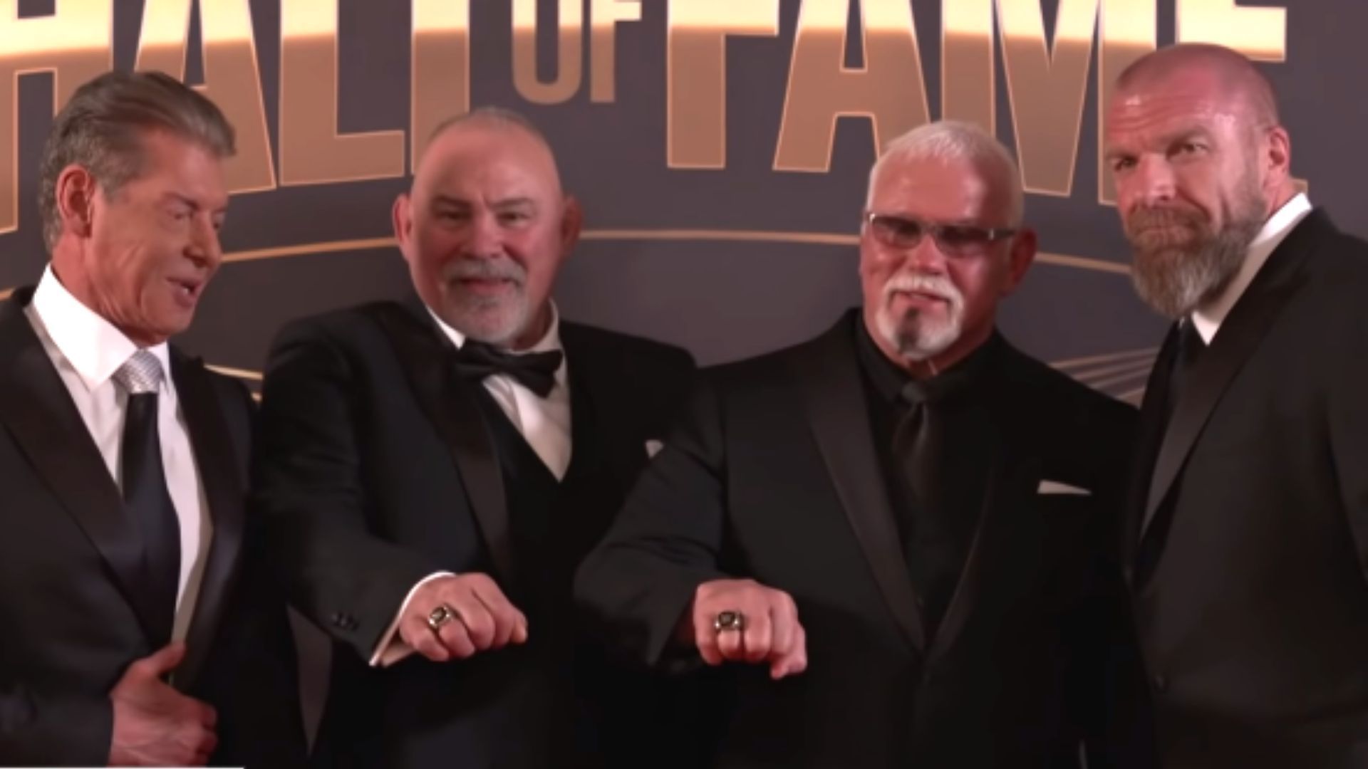 Vince McMahon, The Steiner Brothers, and Triple H backstage at the WWE Hall of Fame ceremony.