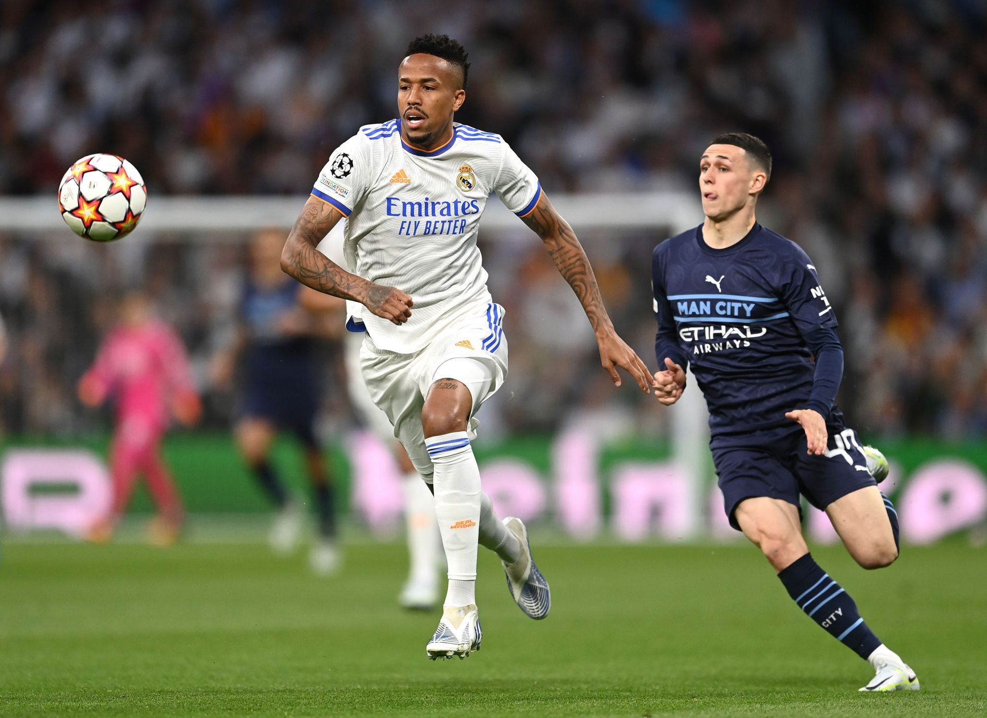 Eder Militao in action against Manchester City.