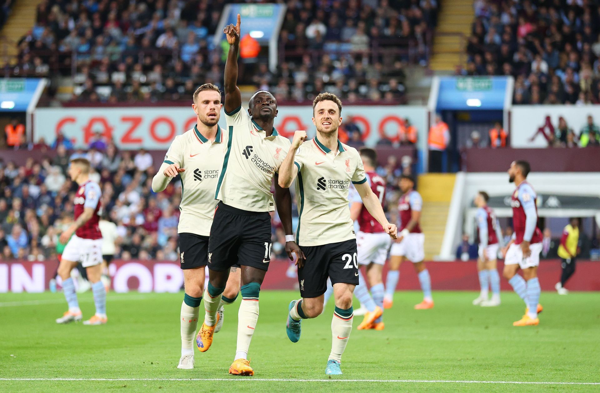 Sadio Mane (C, #10) celebrates his goal against Villa