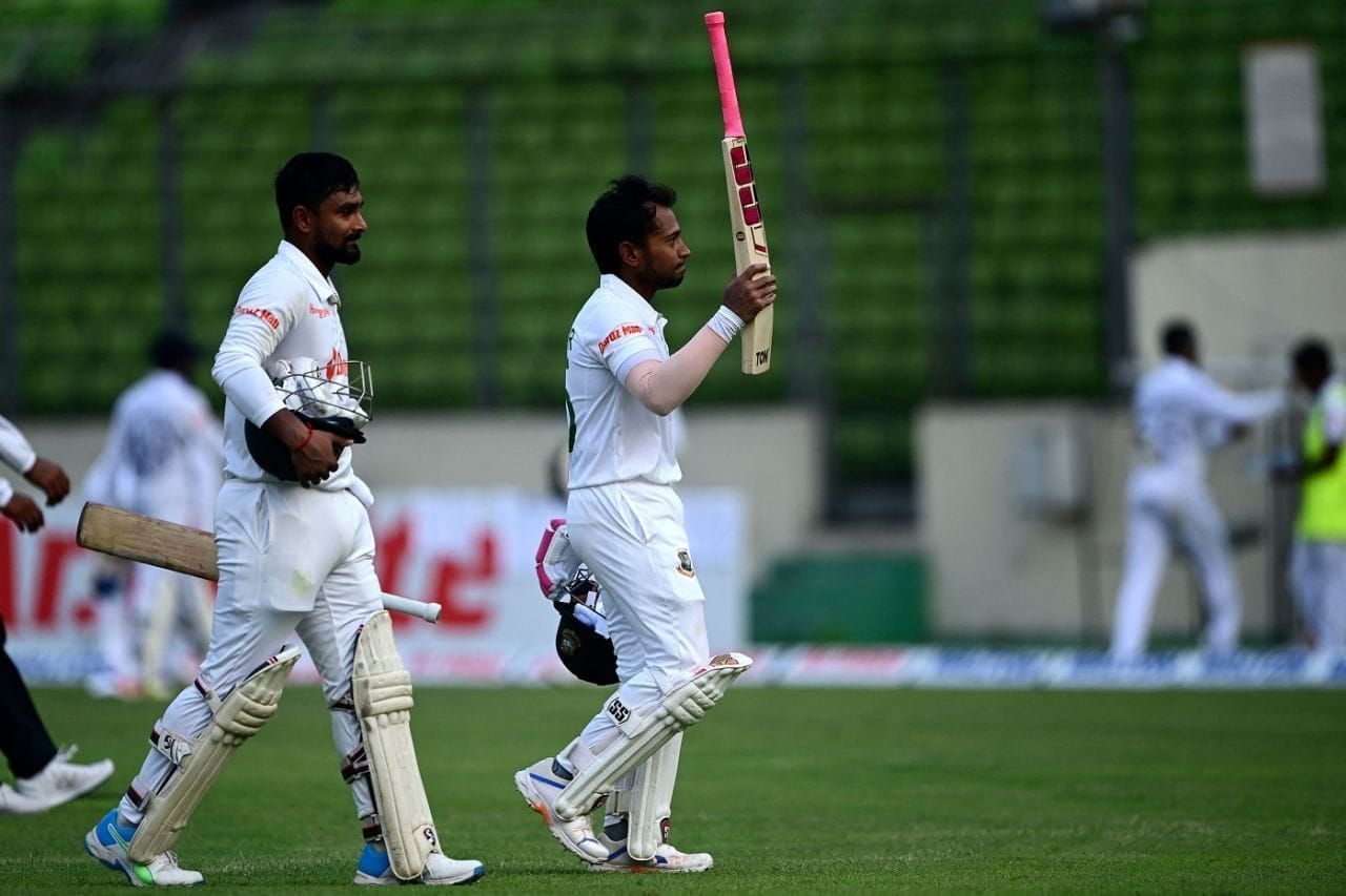 Litton Das and Mushfiqur Rahim walk back after an undefeated partnership on Day 1 of the first Test between Bangladesh and Sri Lanka at Mirpur, 2022. Image Courtesy: Getty Images/AFP
