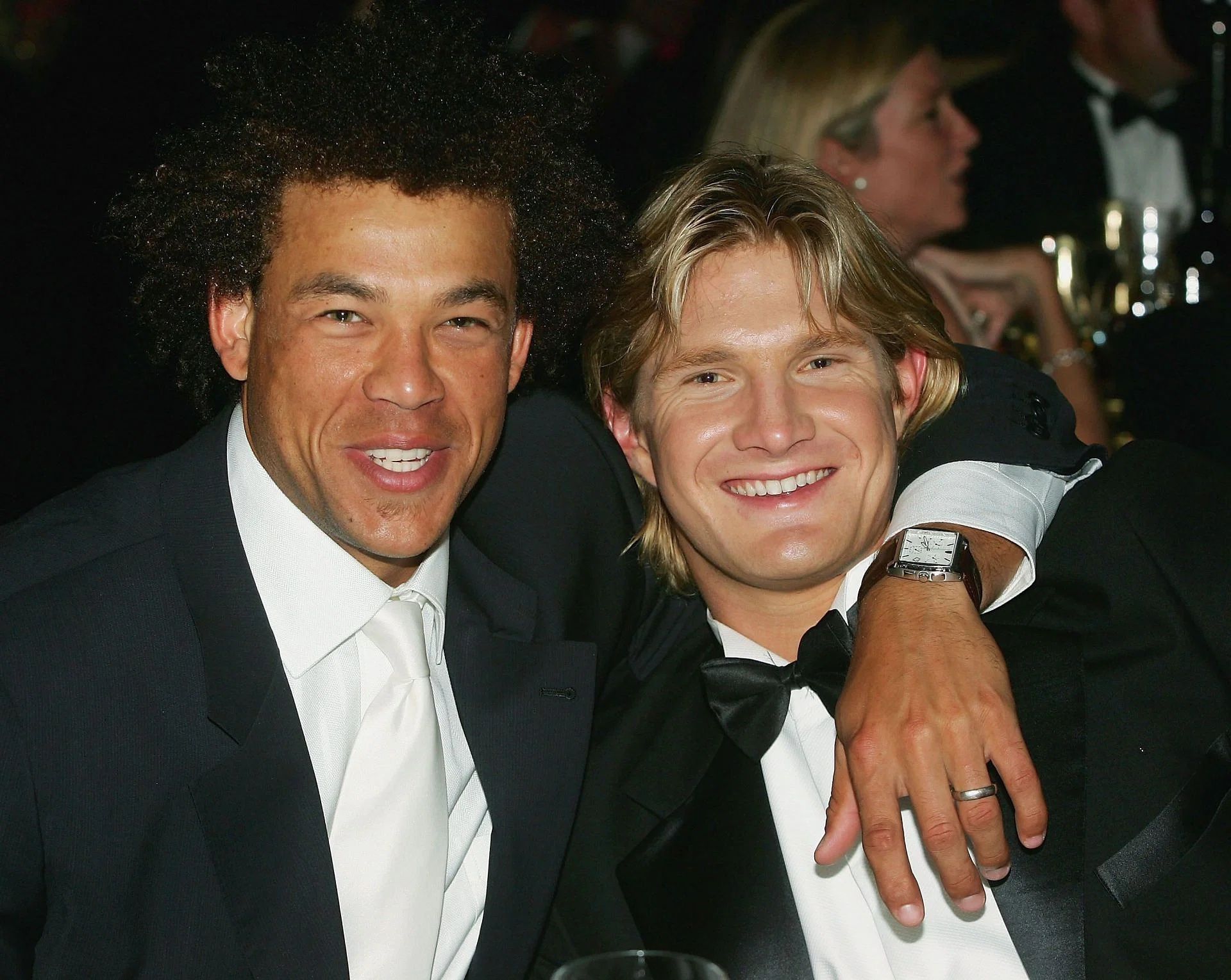Andrew Symonds (left) and Shane Watson enjoy the dinner during the 2005 Allan Border Medal Dinner held at Crown Casino on January 31, 2005 in Melbourne, Australia. Pic: Getty Images