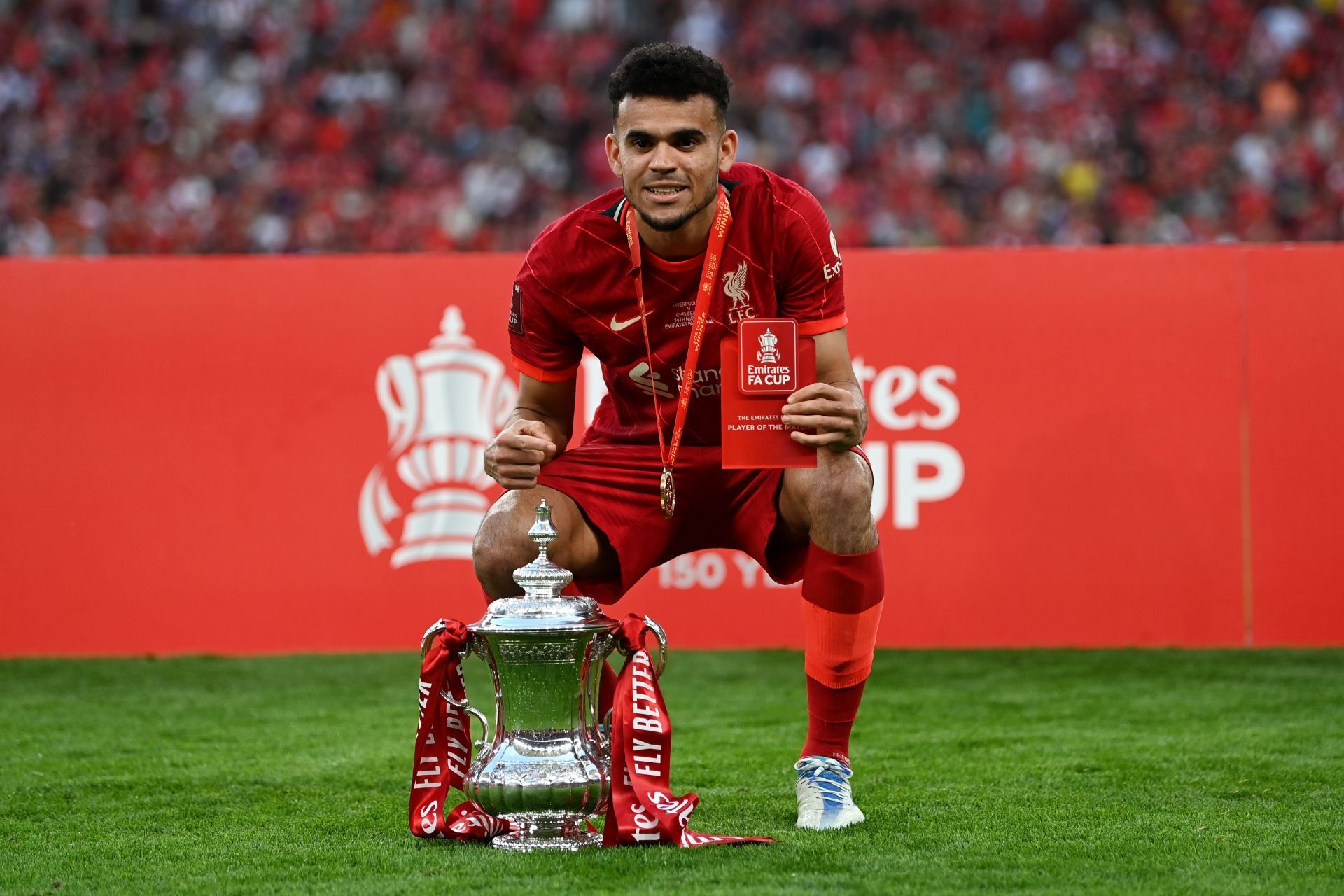 Luis Diaz poses with the FA Cup trophy.