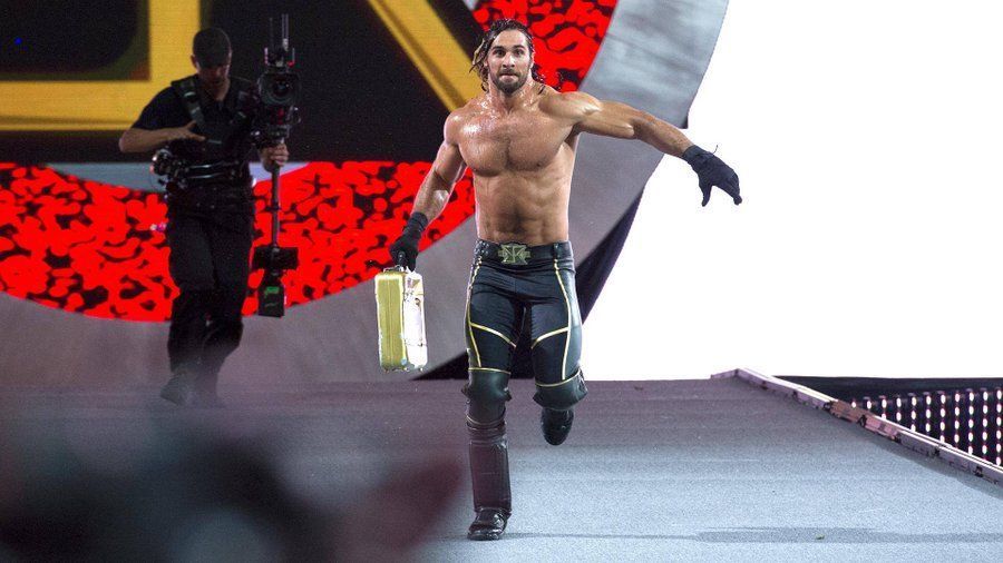 Seth Rollins with the WWE Money in the Bank briefcase