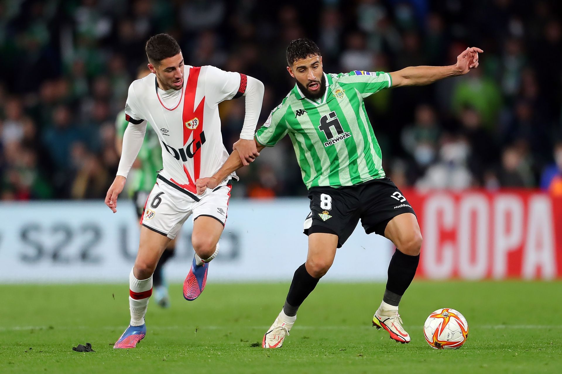 Santiago Comesana (L) in action alongside Nabil Fekir (R)