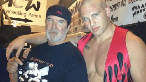 Cody and Scott Hall pose for a picture