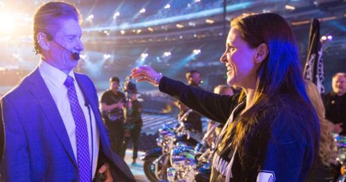 Vince and Stephanie McMahon share a candid moment before a show.