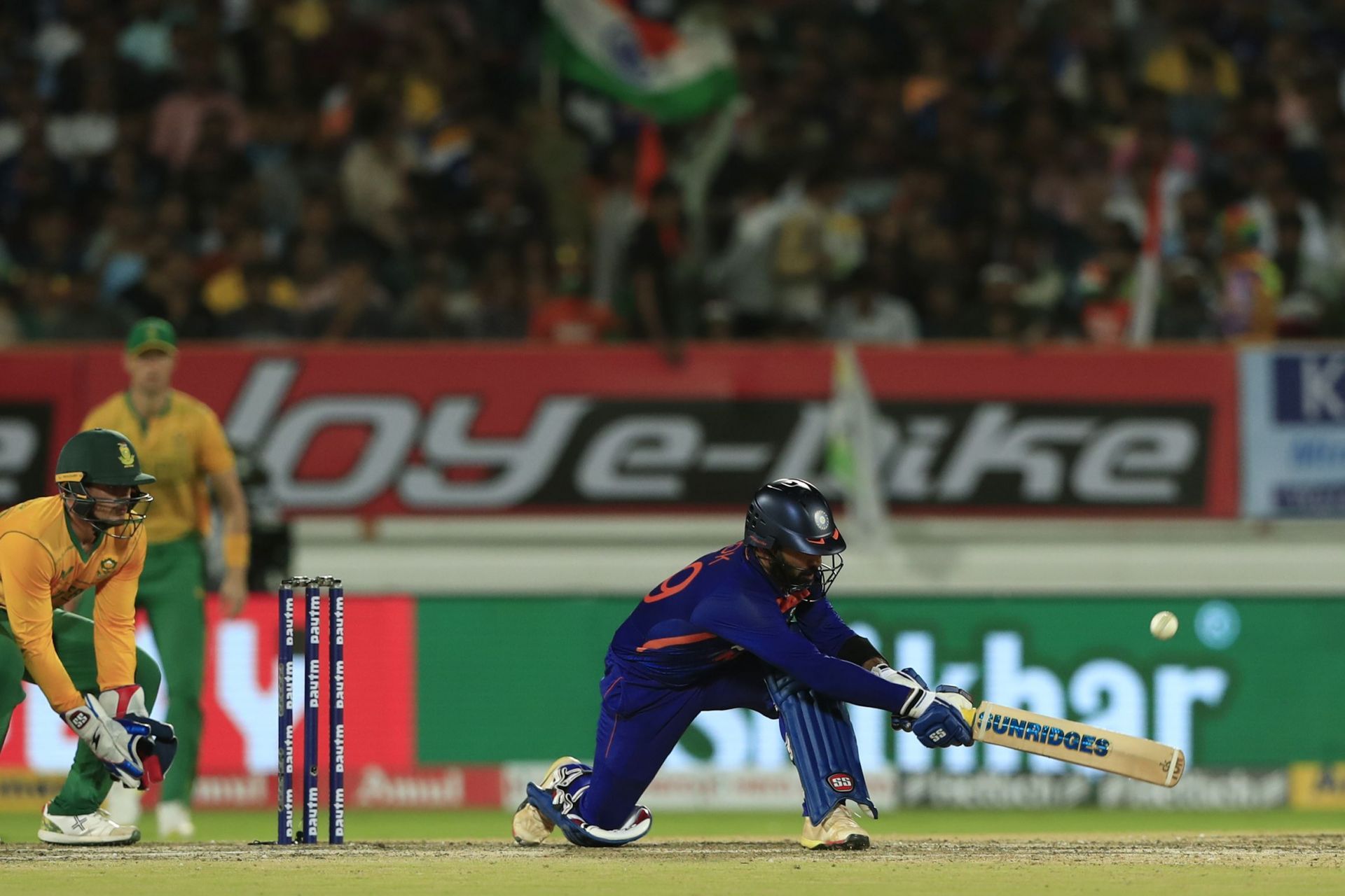 Dinesh Karthik plays a sweep during the fourth T20I. Pic: Getty Images