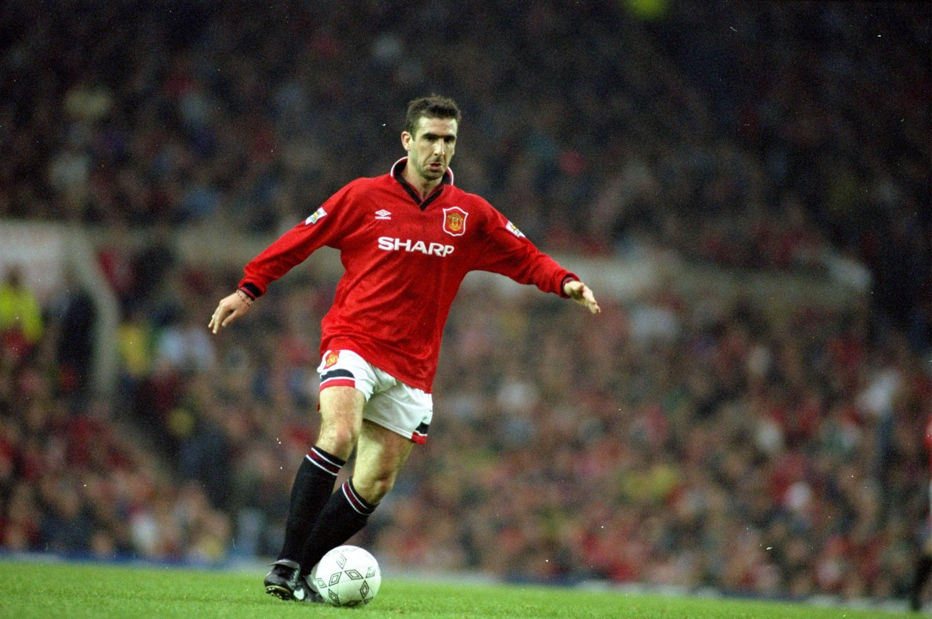 Eric Cantona in action in the Premier League