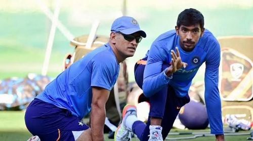 MS Dhoni (left) and Jasprit Bumrah.