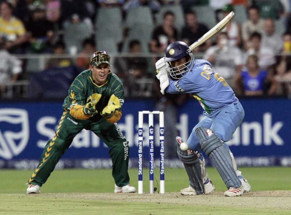 Dinesh Karthik (in action) while playing a shot against South Africa in India&#039;s maiden T20I in 2006.