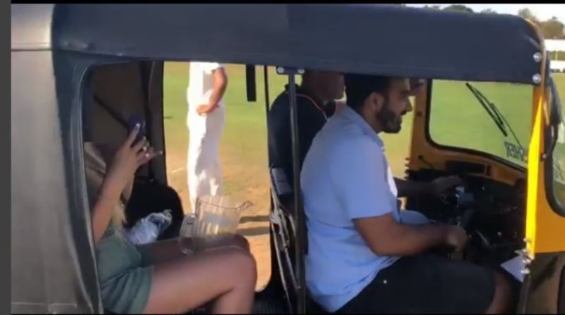 An auto carries drinks during a club game between two fan groups in in Birmingham.