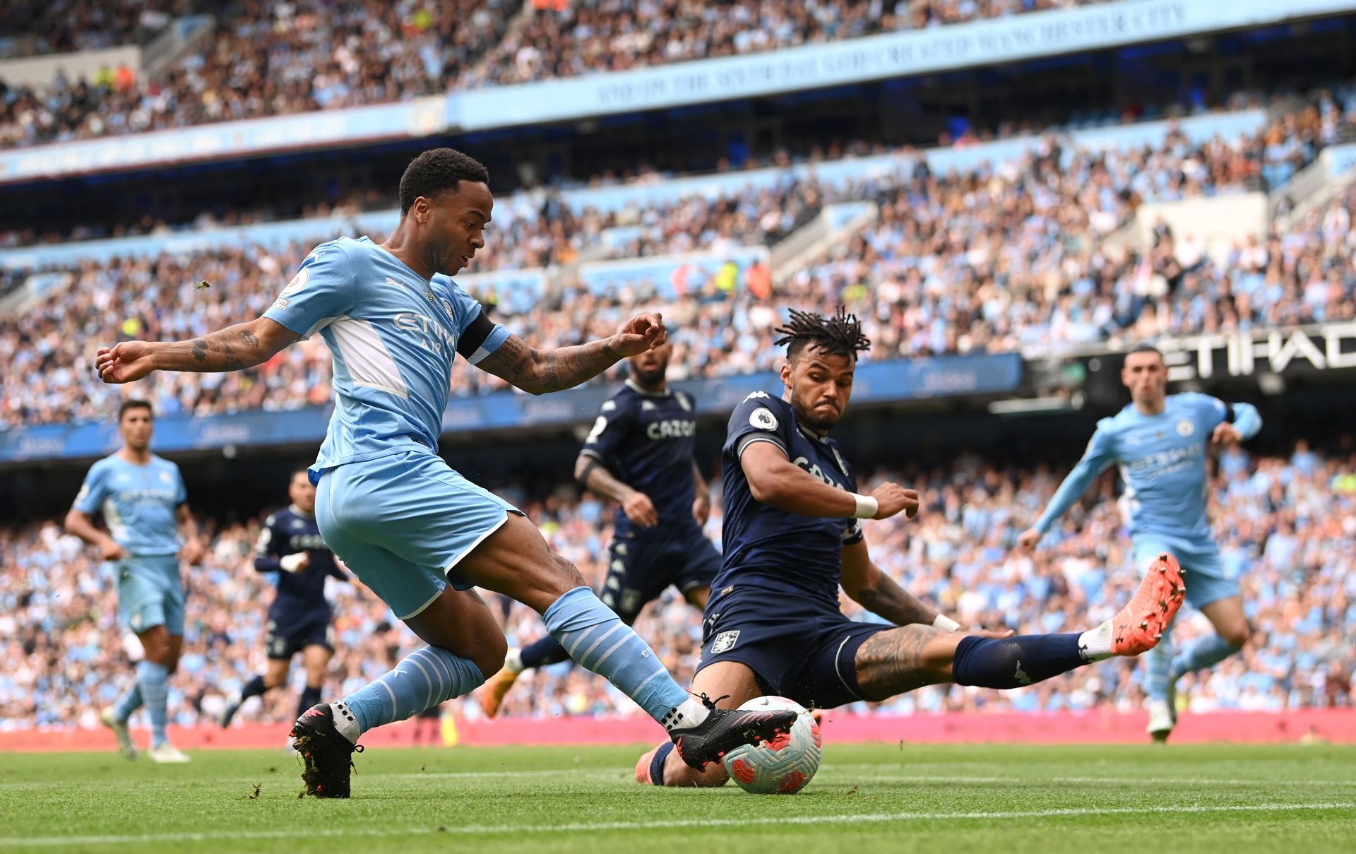 Raheem Sterling (left) is wanted at Stamford Bridge.