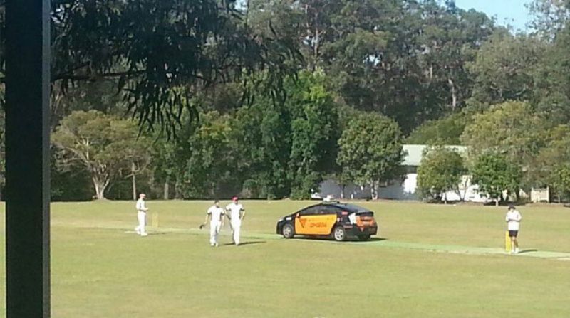 A cab driver in Brisbane halted a match after a ball hit his vehicle when parked out of the ground. Pic: Facebook