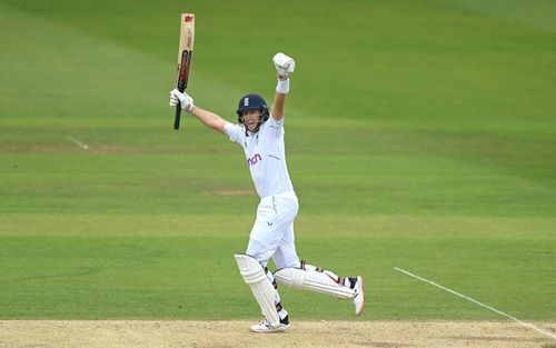 Joe Root celebrates after reaching his hundred against New Zealand in the first Test at Lord's. Image Courtesy: Getty Images