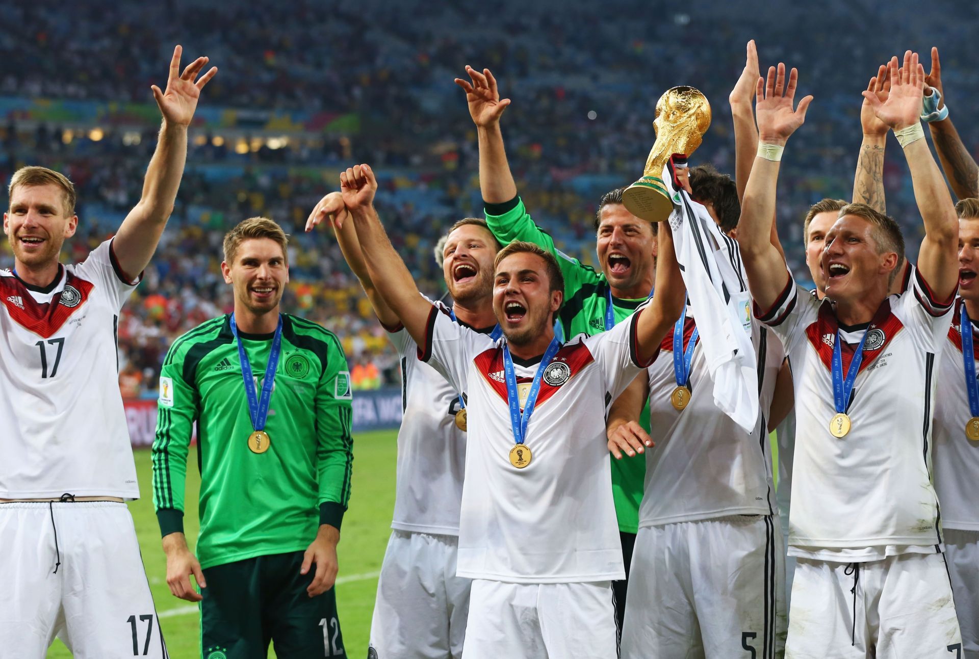 Gotze celebrating with the cup after scoring the winning goal in 2014