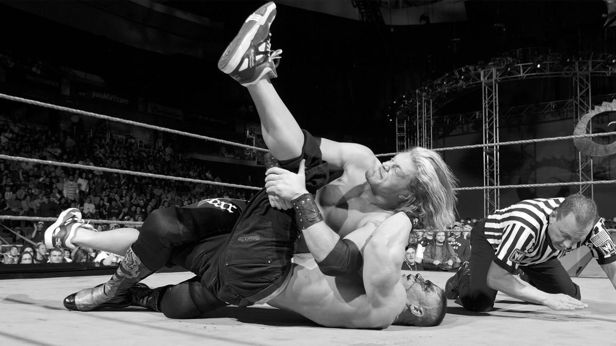 Edge defeats John Cena to win the WWE Championship