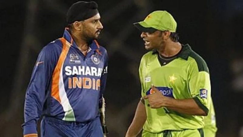 Indian cricketer Harbhajan Singh and Pakistan's Shoaib Akhtar have a go at each other.