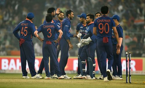 The Men in Blue celebrate a wicket.