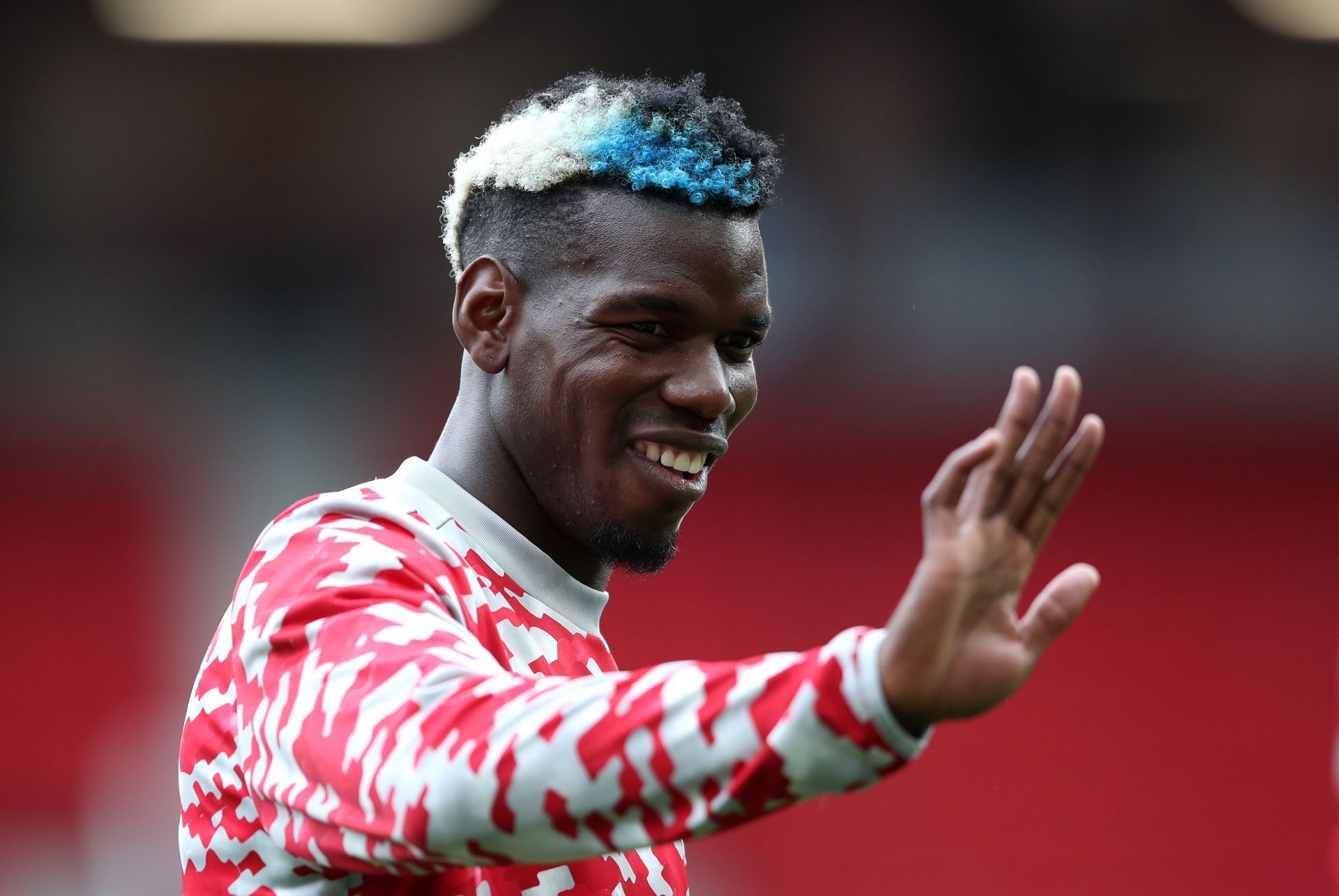 Paul Pogba waves goodbye to United