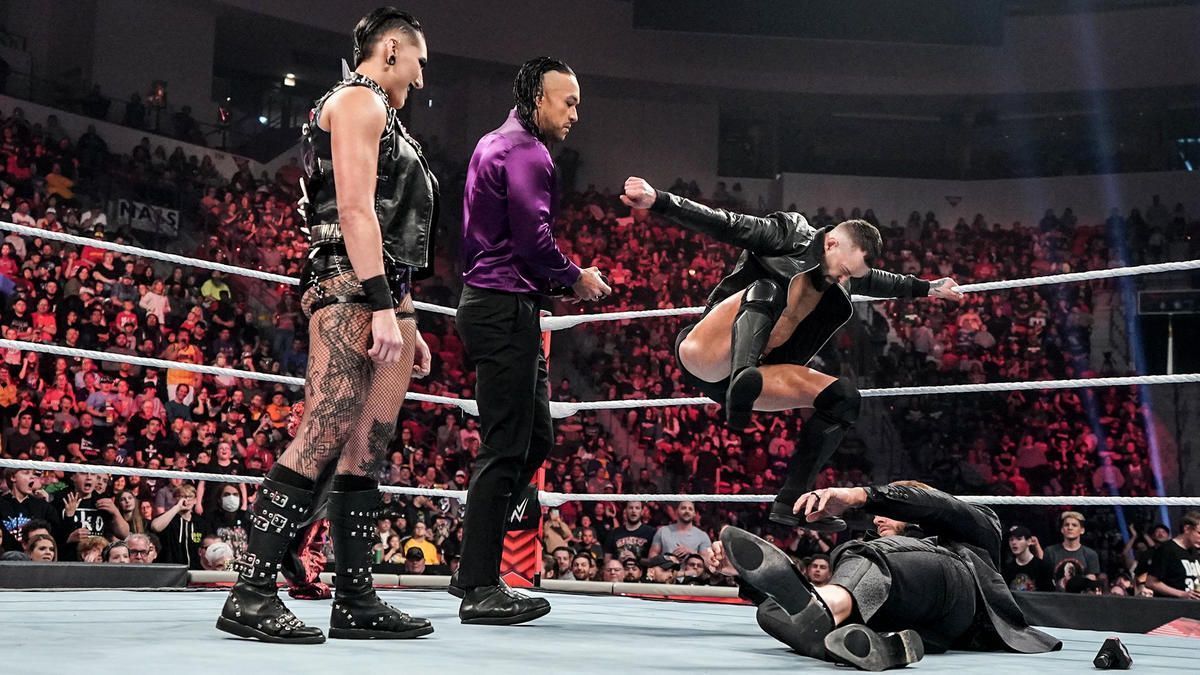 Finn Bálor attacking Edge with The Judgment Day