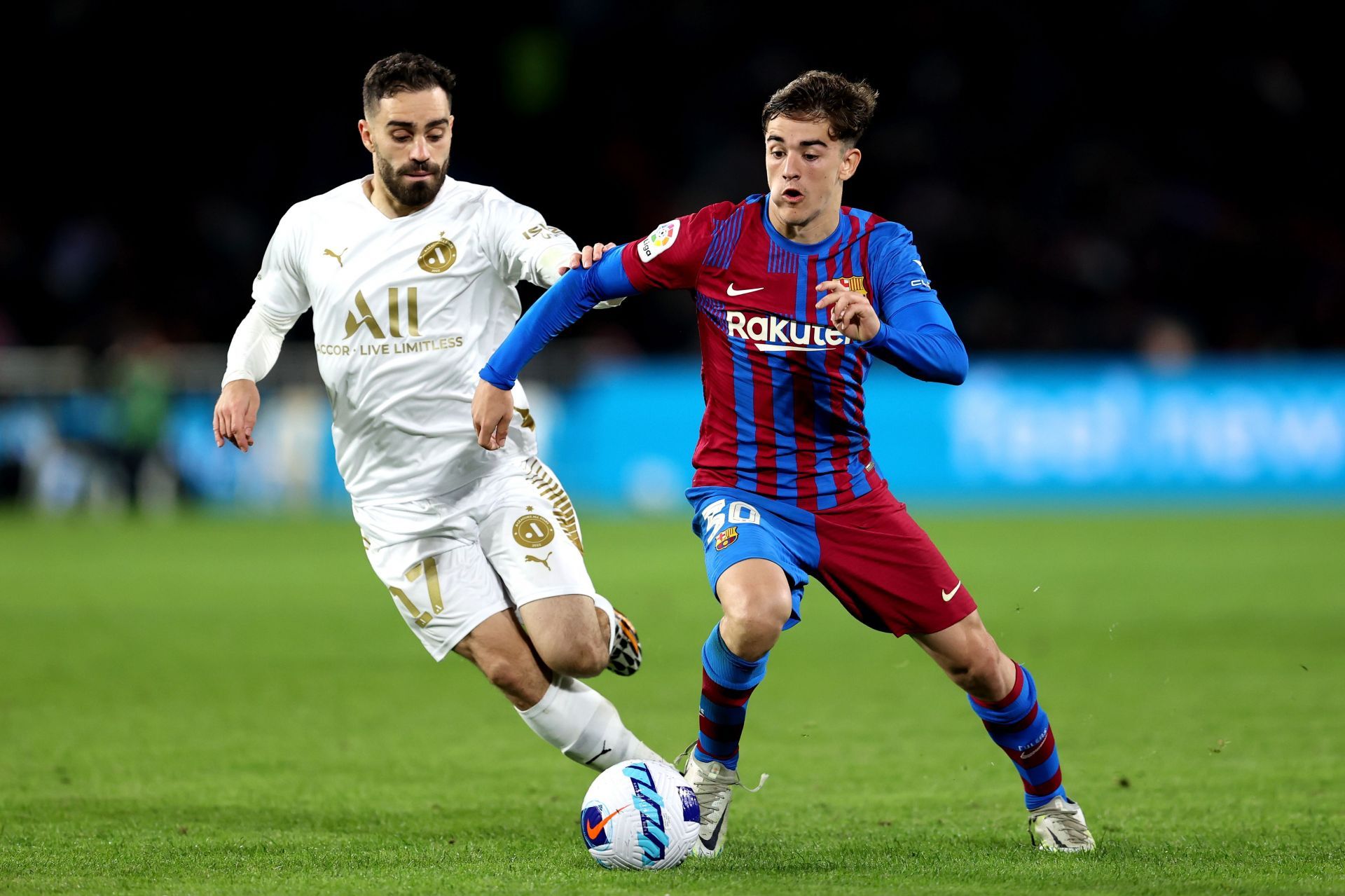 Gavi (right) has caught the eye at the Camp Nou.