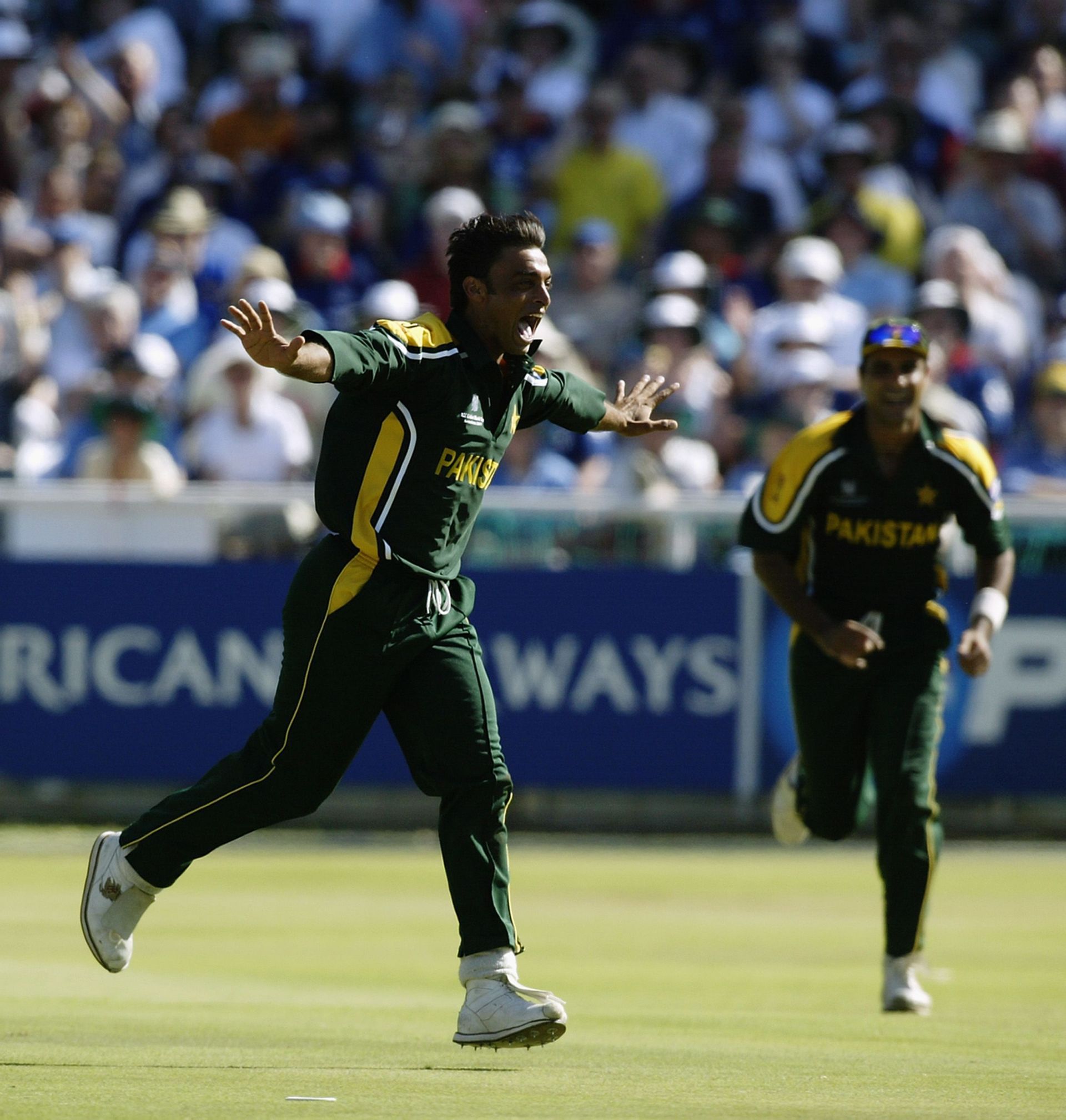 Shoaib Akhtar of Pakistan celebrates after Michael Vaughan of England is caught by Younis Khan of Pakistan off his bowling