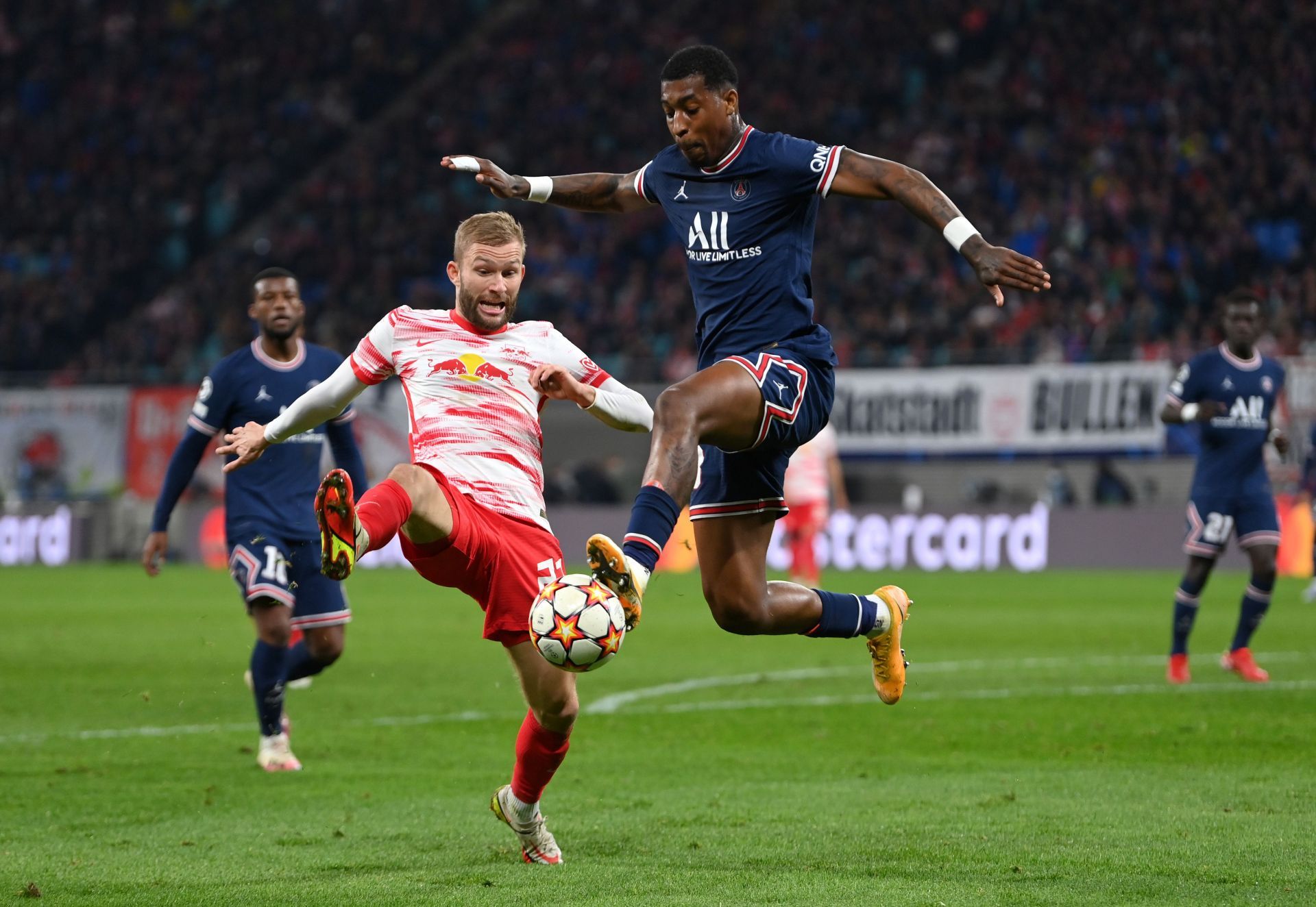 Presnel Kimpembe (right) has drawn interest from Chelsea