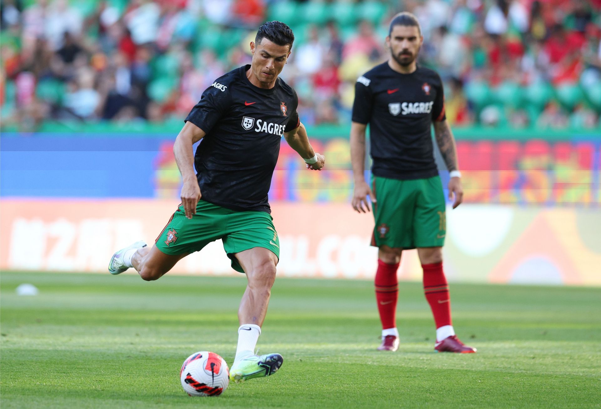 Raphael Varane wants Cristiano Ronaldo (left) to prolong his stay at Old Trafford.