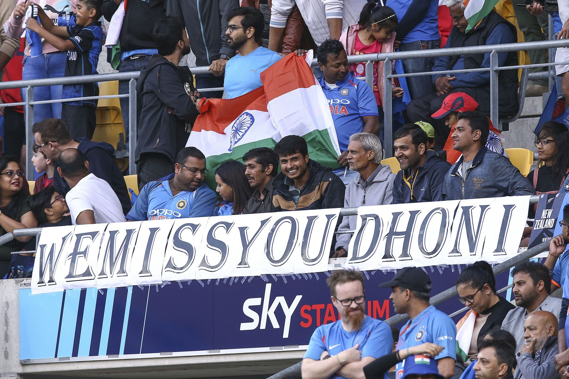 It is a common sight to see Indian fans with &quot;We Miss You Dhoni&quot; posters at stadiums (Image: Getty).