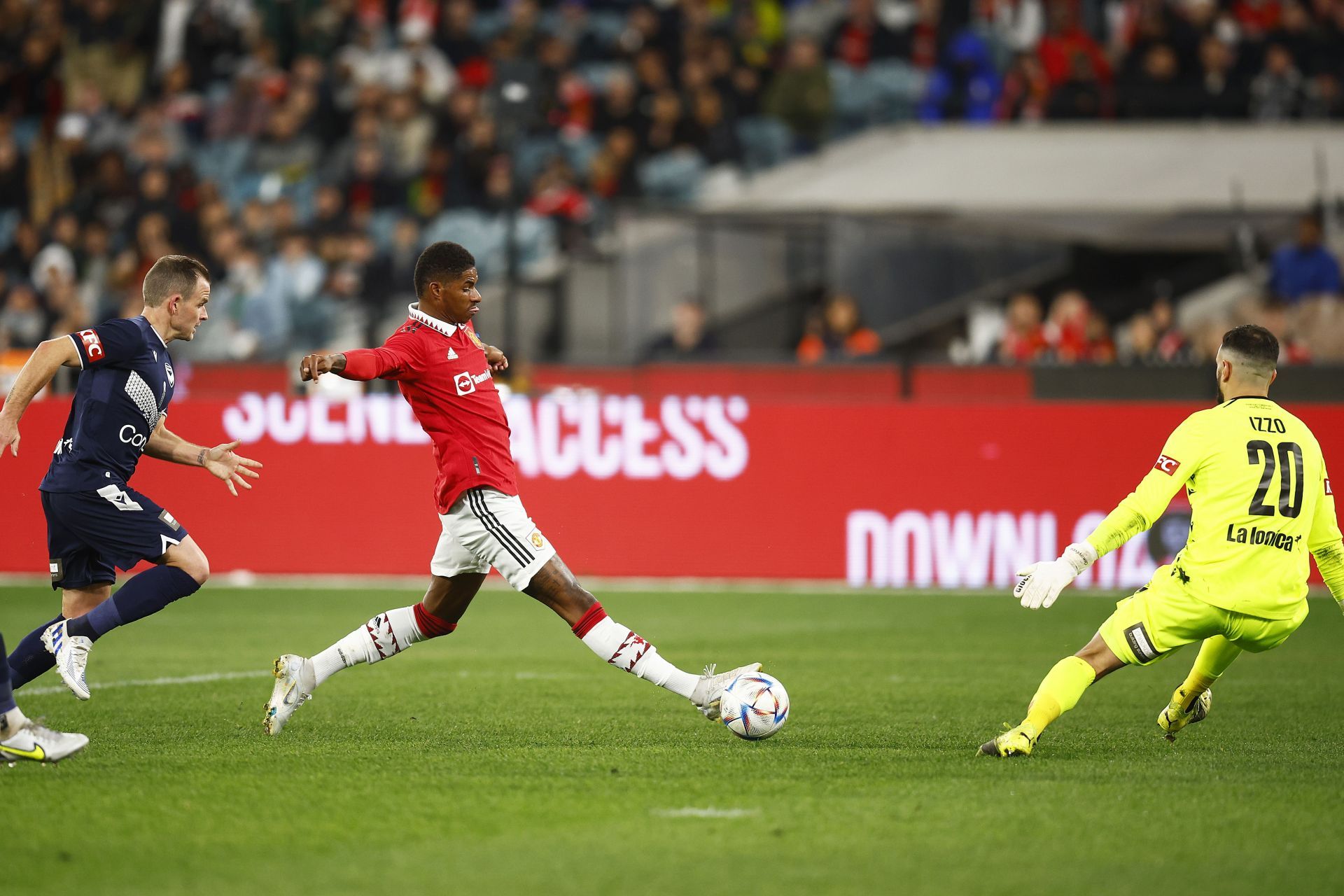 Marcus Rashford scores Manchester United&#039;s third goal against Melbourne Victory.